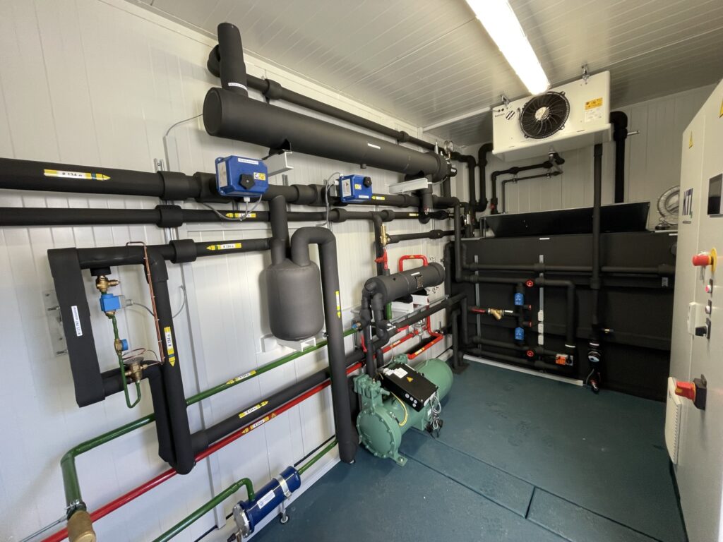 Interior view of the CombiWater. In the background you can see the ice water basin, on the left the heat pump unit.